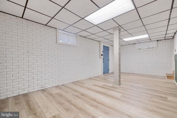 Empty room, Interior, Recessed Lighting, Stone Walls, Wood Texture Flooring