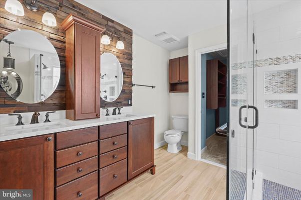 Bathroom, Dual Sink Vanities, Glass Shower, Interior, Wood Texture Flooring