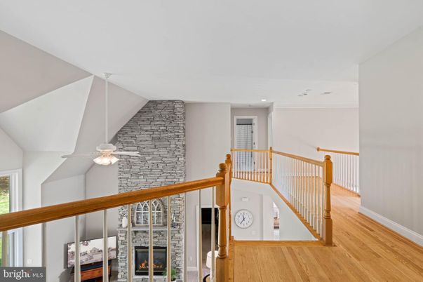 Fireplace, Interior, Recessed Lighting, Stone Walls, Wood Texture Flooring