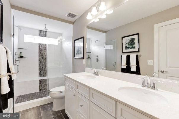 Bathroom, Dual Sink Vanities, Glass Shower, Interior, Wood Texture Flooring