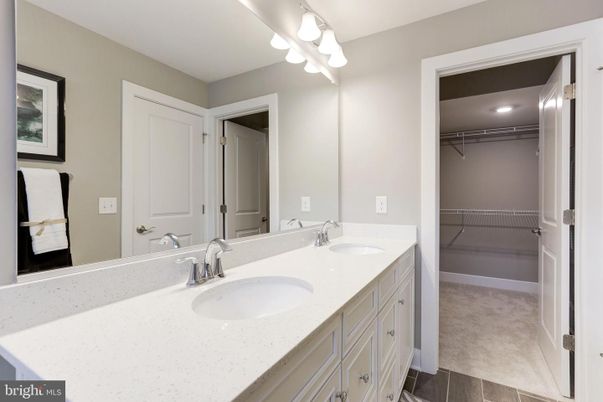 Bathroom, Dual Sink Vanities, Interior, Walk-in Closets, Wood Texture Flooring