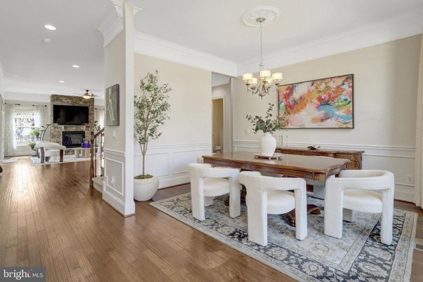 Chandelier, Dining room, Fireplace, Interior, Recessed Lighting, Wood Texture Flooring