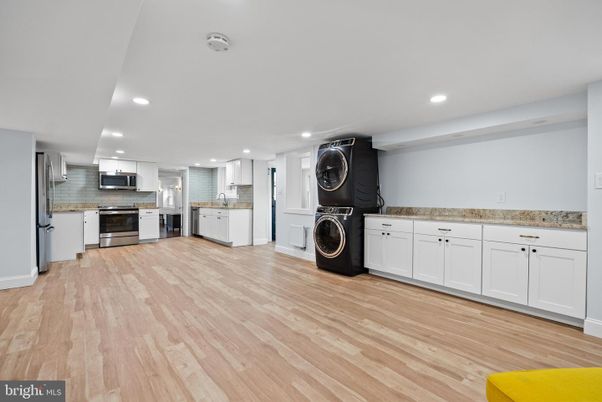 Interior, Kitchen, Recessed Lighting, Stainless Steel Appliances, Washer, Wood Texture Flooring