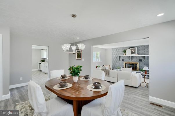 Dining room, Fireplace, Interior, Living room, Pendant Lights, Recessed Lighting, Stone Walls, Wood Texture Flooring