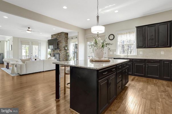 Fireplace, Interior, Kitchen, Living room, Pendant Lights, Recessed Lighting, Stone Walls, Wood Texture Flooring