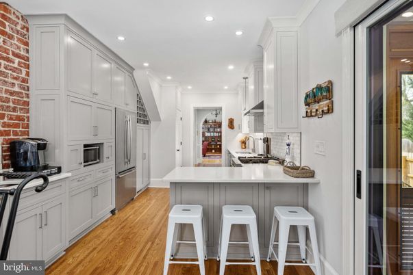 Interior, Kitchen, Recessed Lighting, Stainless Steel Appliances, Stone Walls, Wood Texture Flooring
