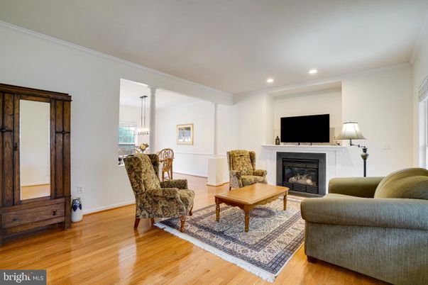 Dining room, Fireplace, Interior, Living room, Pendant Lights, Recessed Lighting, Wood Texture Flooring
