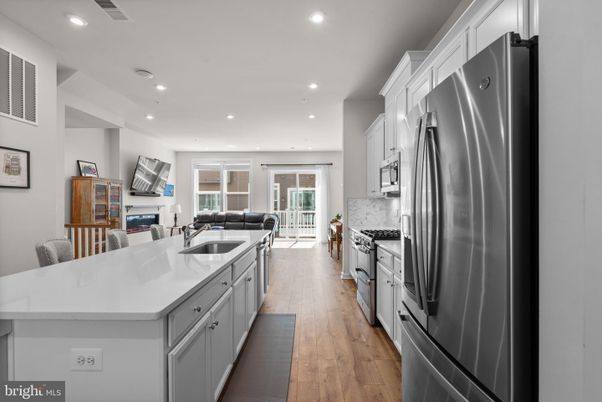 Interior, Kitchen, Living room, Recessed Lighting, Stainless Steel Appliances, Wood Texture Flooring
