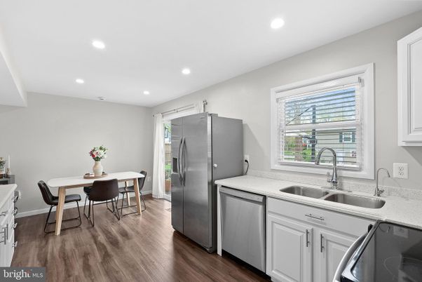 Dining room, Interior, Kitchen, Recessed Lighting, Stainless Steel Appliances, Wood Texture Flooring