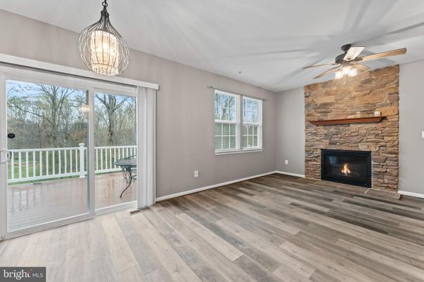Empty room, Fireplace, Interior, Pendant Lights, Stone Walls, Wood Texture Flooring