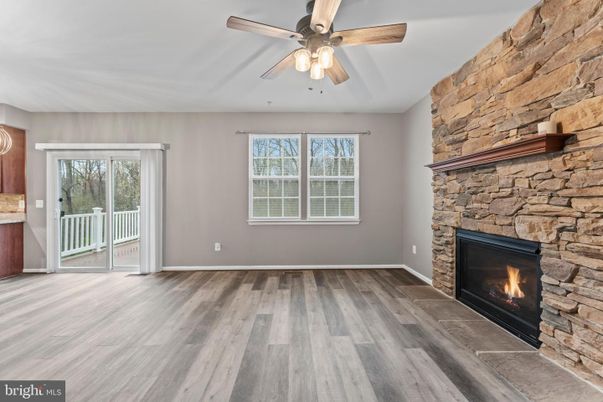 Empty room, Fireplace, Interior, Stone Walls, Wood Texture Flooring