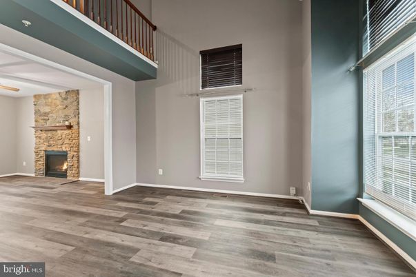 Empty room, Fireplace, Interior, Stone Walls, Wood Texture Flooring