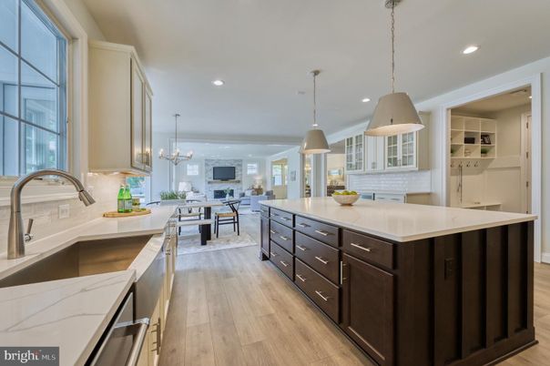 Chandelier, Dining room, Interior, Kitchen, Pendant Lights, Recessed Lighting, Stainless Steel Appliances, Wood Texture Flooring