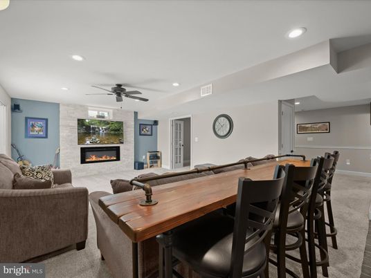 Dining room, Fireplace, Interior, Living room, Recessed Lighting, Stone Walls