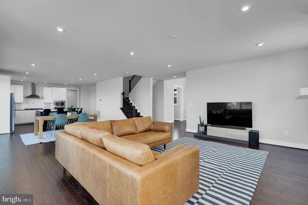 Dining room, Interior, Kitchen, Living room, Recessed Lighting, Stainless Steel Appliances, Wood Texture Flooring