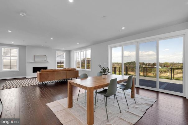 Dining room, Fireplace, Interior, Living room, Recessed Lighting, Wood Texture Flooring