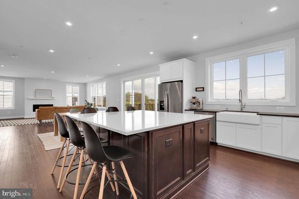 Dining room, Interior, Kitchen, Recessed Lighting, Stainless Steel Appliances, Wood Texture Flooring