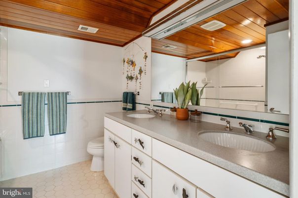 Bathroom, Dual Sink Vanities, Interior, Recessed Lighting, Wooden Ceilings