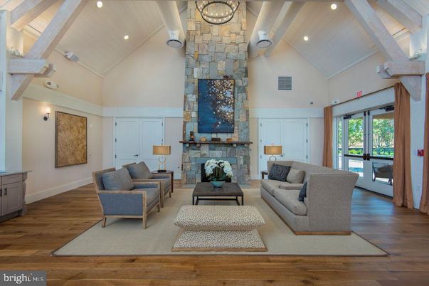 Fireplace, Interior, Living room, Recessed Lighting, Stone Walls, Wood Texture Flooring