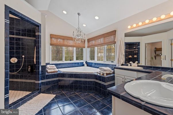 Bathroom, Chandelier, Dual Sink Vanities, Glass Shower, Interior, Recessed Lighting