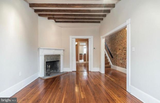 Empty room, Fireplace, Interior, Stone Walls, Wooden Beams, Wood Texture Flooring