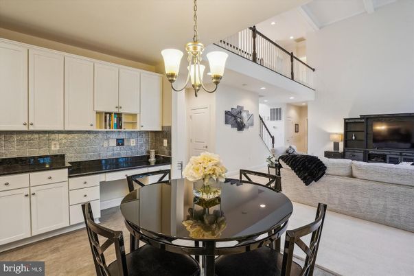 Chandelier, Dining room, Interior, Kitchen, Living room, Pendant Lights, Recessed Lighting, Wood Texture Flooring
