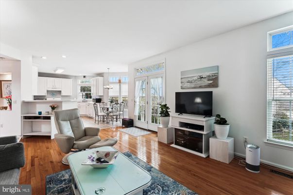 Dining room, Interior, Kitchen, Living room, Pendant Lights, Recessed Lighting, Stainless Steel Appliances, Wood Texture Flooring