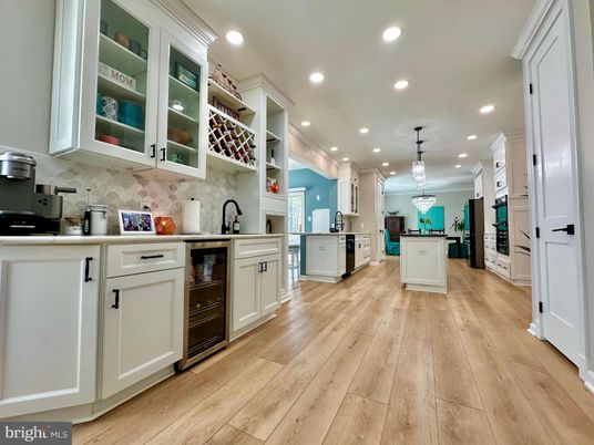Chandelier, Interior, Kitchen, Pendant Lights, Recessed Lighting, Stainless Steel Appliances, Wood Texture Flooring