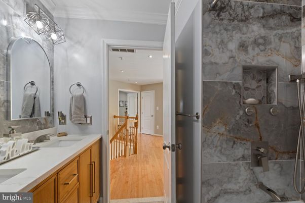 Bathroom, Dual Sink Vanities, Interior, Recessed Lighting, Wood Texture Flooring