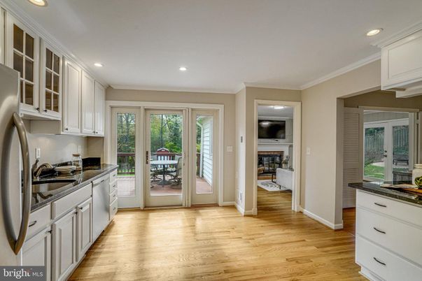 Dining room, Fireplace, Interior, Kitchen, Recessed Lighting, Wood Texture Flooring
