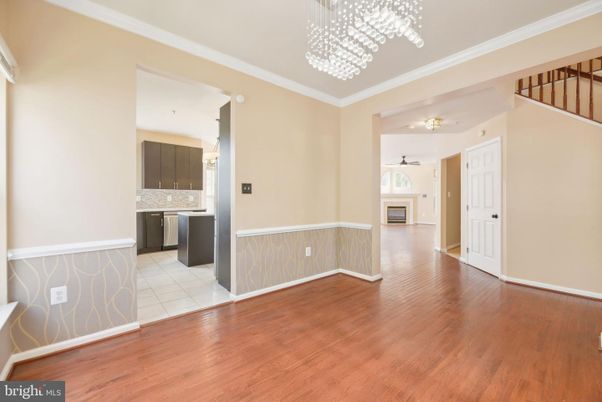 Chandelier, Empty room, Fireplace, Interior, Kitchen, Wood Texture Flooring