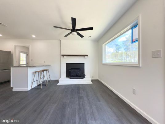 Empty room, Fireplace, Interior, Kitchen, Recessed Lighting, Wood Texture Flooring