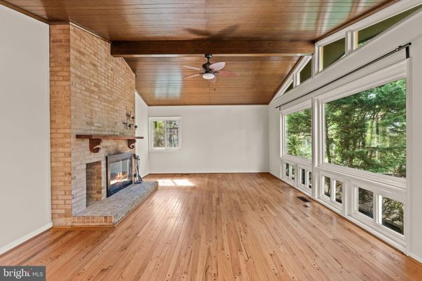 Empty room, Fireplace, Interior, Stone Walls, Wooden Beams, Wooden Ceilings, Wood Texture Flooring