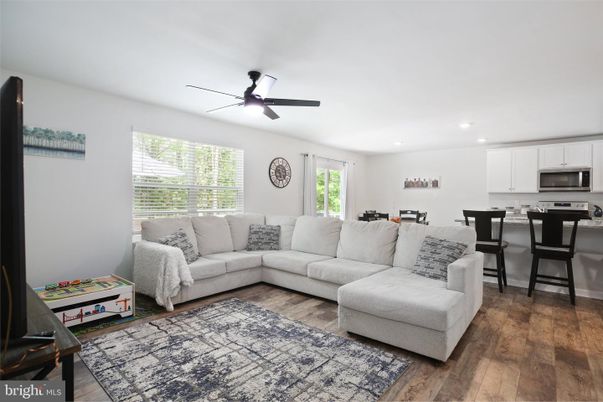 Dining room, Interior, Kitchen, Living room, Recessed Lighting, Stainless Steel Appliances, Wood Texture Flooring