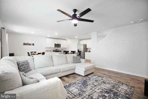 Dining room, Interior, Kitchen, Living room, Recessed Lighting, Stainless Steel Appliances, Wood Texture Flooring
