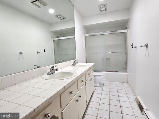 Bathroom, Dual Sink Vanities, Glass Shower, Interior, Recessed Lighting, Tile Countertops