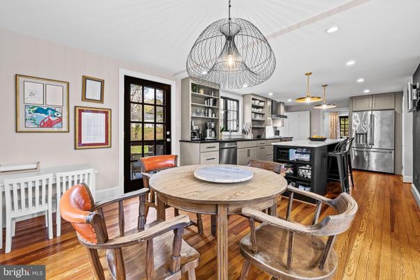 Dining room, Interior, Kitchen, Pendant Lights, Recessed Lighting, Stainless Steel Appliances, Wood Texture Flooring