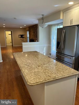 Fireplace, Interior, Kitchen, Pendant Lights, Recessed Lighting, Stone Walls, Wood Texture Flooring