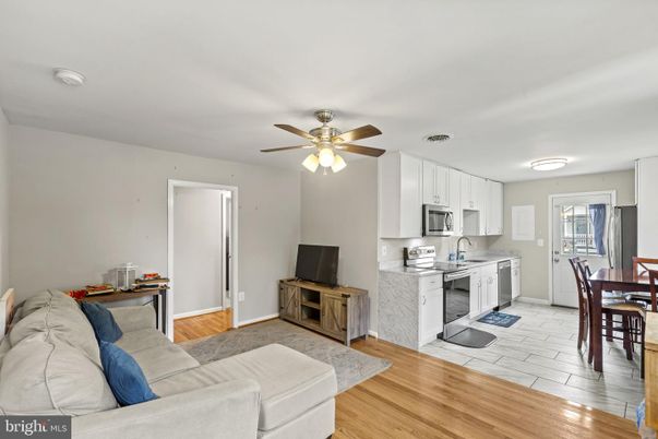 Dining room, Interior, Kitchen, Living room, Stainless Steel Appliances, Wood Texture Flooring
