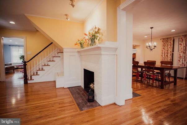 Chandelier, Dining room, Fireplace, Interior, Recessed Lighting, Wood Texture Flooring