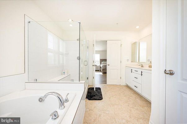 Bathroom, Bedroom, Dual Sink Vanities, Glass Shower, Interior, Recessed Lighting