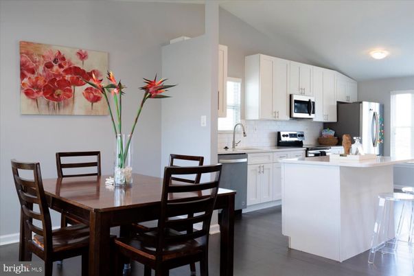 Dining room, Interior, Kitchen, Recessed Lighting, Stainless Steel Appliances, Wood Texture Flooring