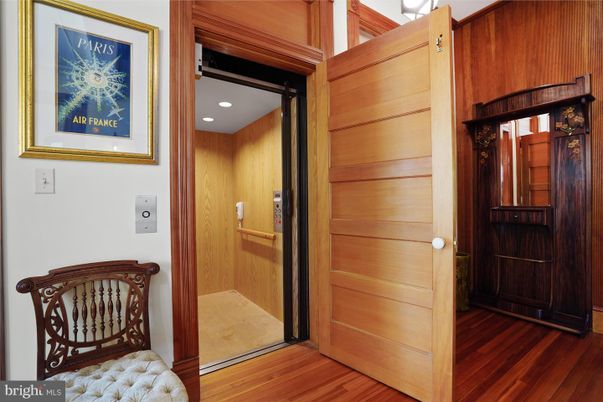 Elevator, Interior, Recessed Lighting, Wood Texture Flooring, Wooden Walls