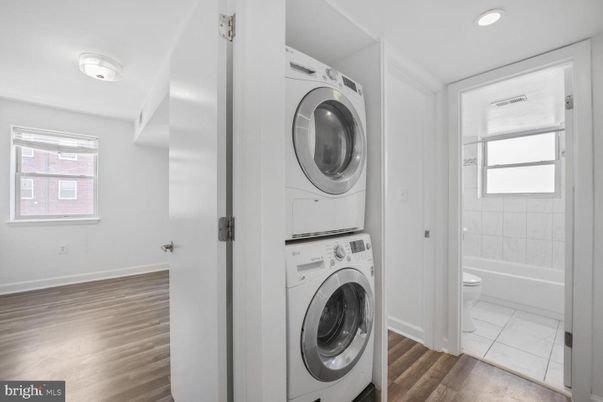 Bathroom, Interior, Recessed Lighting, Utility Closets, Washer, Wood Texture Flooring