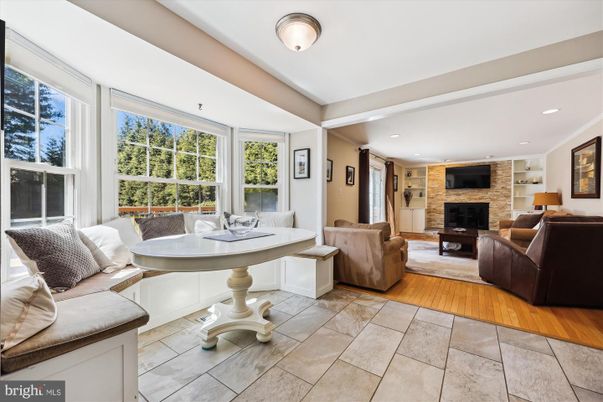 Fireplace, Interior, Living room, Recessed Lighting, Stone Walls, Wood Texture Flooring