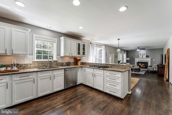 Fireplace, Interior, Kitchen, Pendant Lights, Recessed Lighting, Stainless Steel Appliances, Wood Texture Flooring