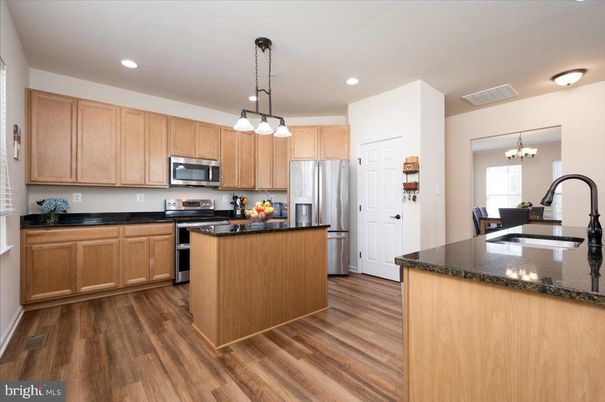 Chandelier, Interior, Kitchen, Pendant Lights, Recessed Lighting, Stainless Steel Appliances, Wood Texture Flooring