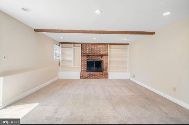 Empty room, Fireplace, Interior, Recessed Lighting, Stone Walls, Wooden Beams