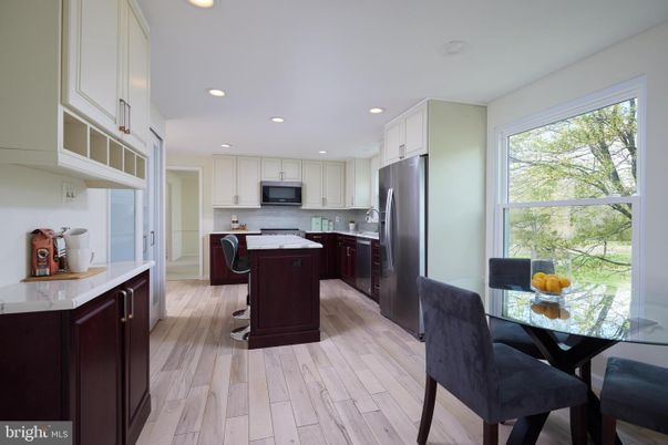 Dining room, Interior, Kitchen, Recessed Lighting, Stainless Steel Appliances, Wood Texture Flooring