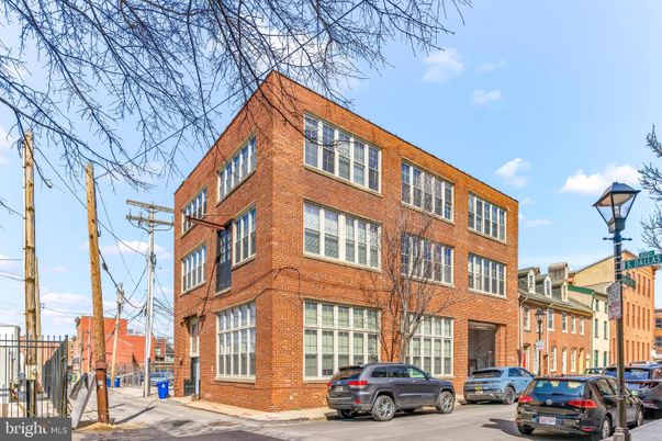 Exterior, Facade, Brick Facade, Condo Building